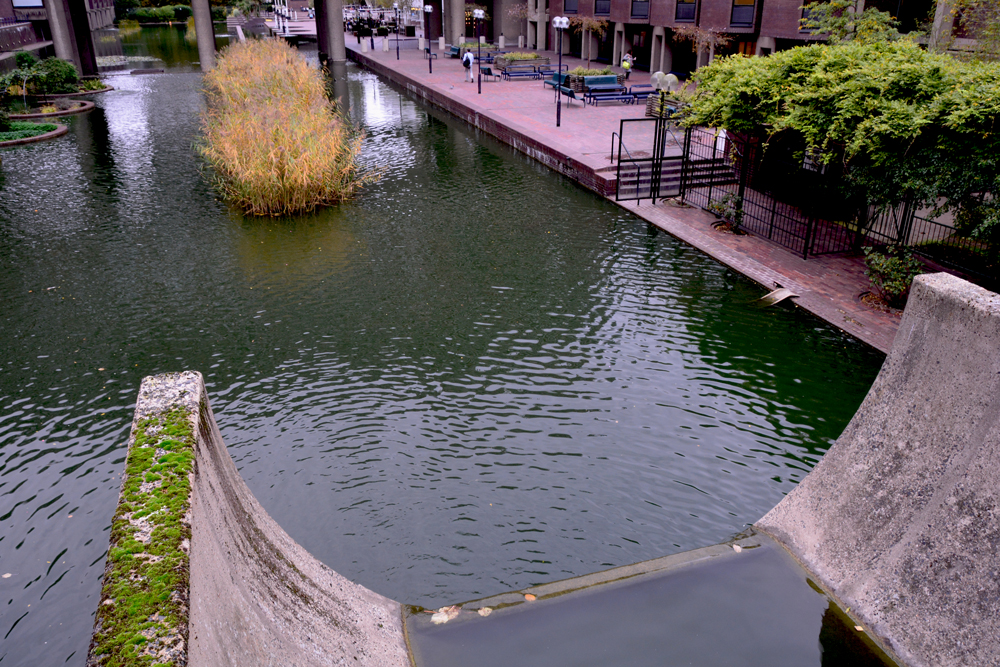 concrete fountain over barbican lake