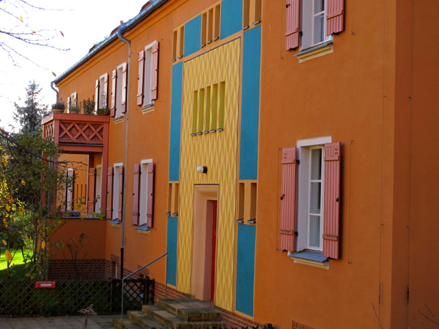 facade of a home on the paintbox settlement the falkenberg garden city