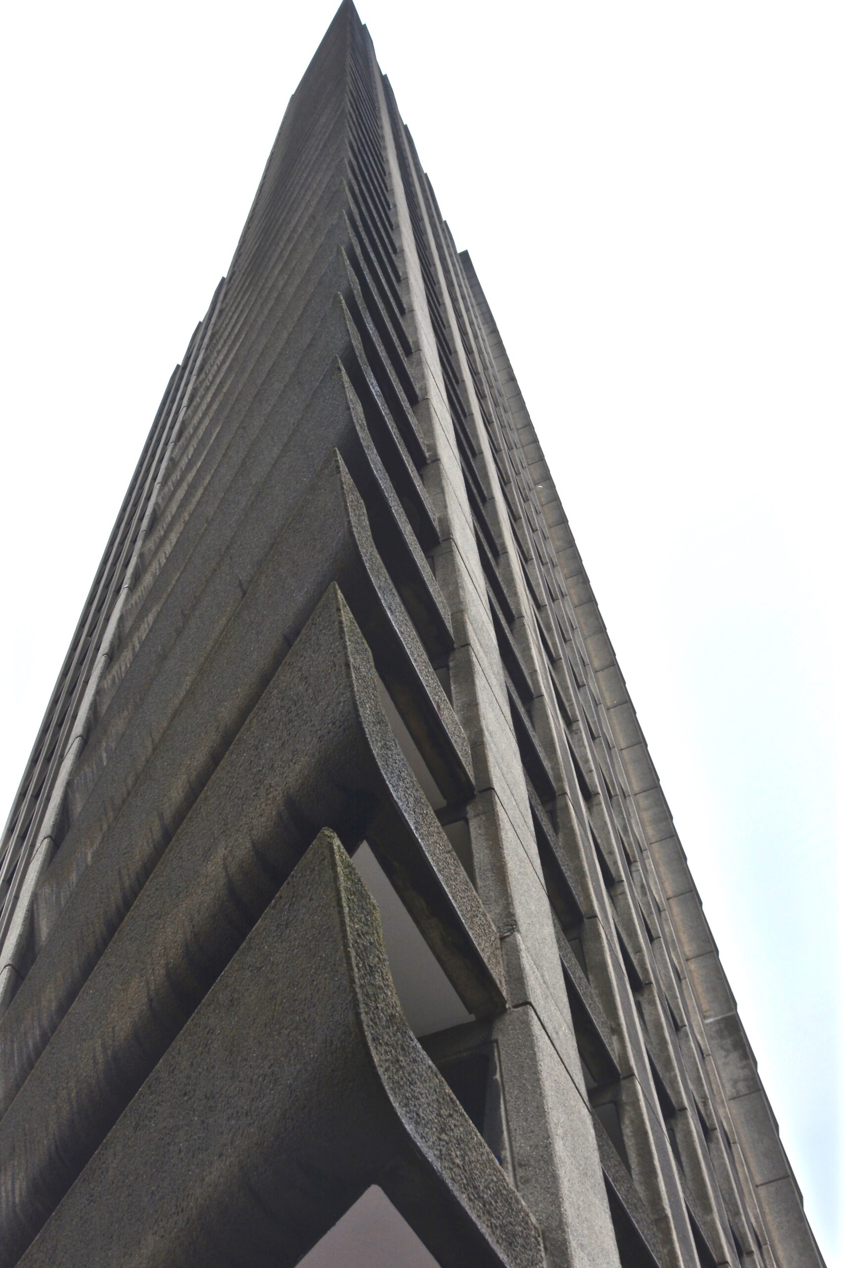 Barbican Lauderdale Tower against a grey sky