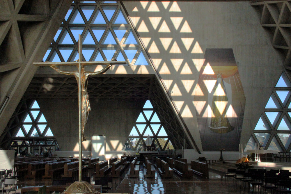 interior of light playing onto concrete wall