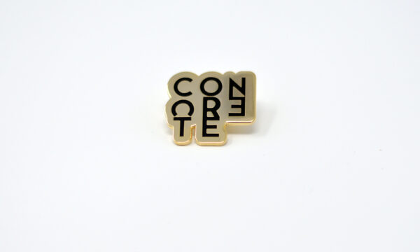 metal badge with word concrete