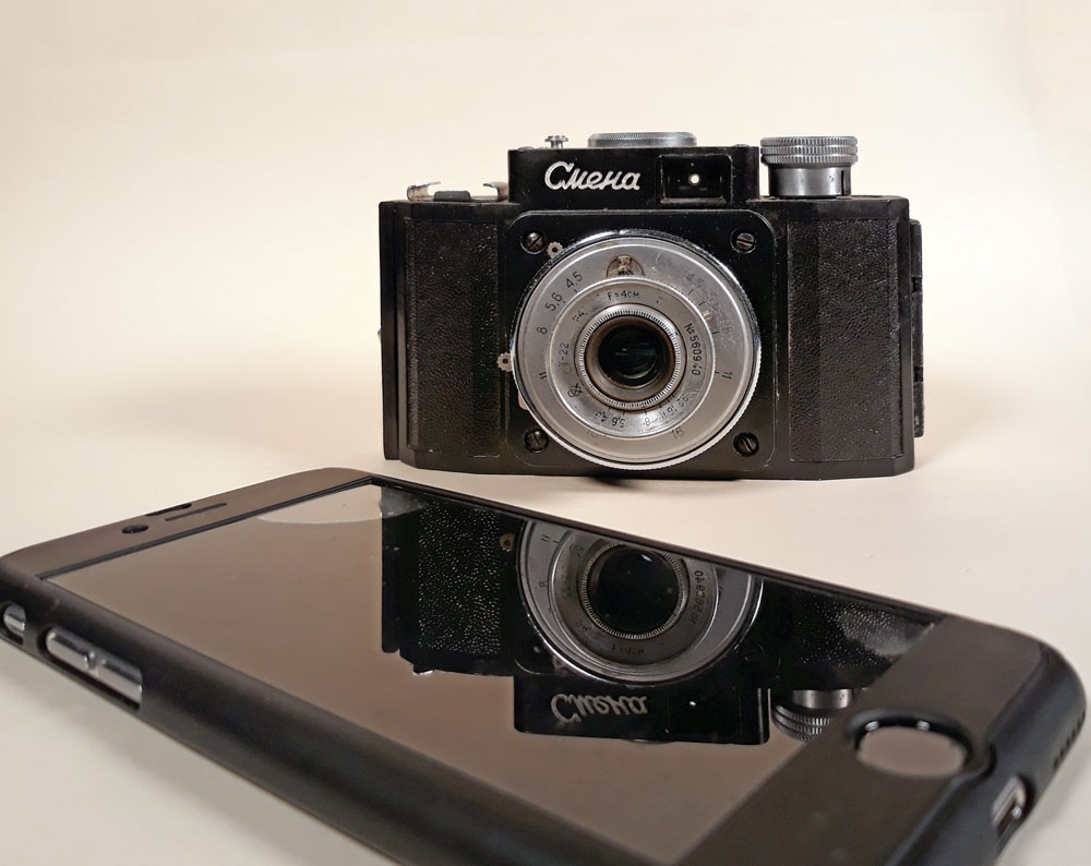 SOVIET SMENA CAMERA AND A SMARTPHONE 