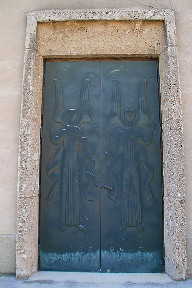 vienna catholic church Pfarrkirche-Liesing-church-vienna-austria-exterior-door-with-angel-detail