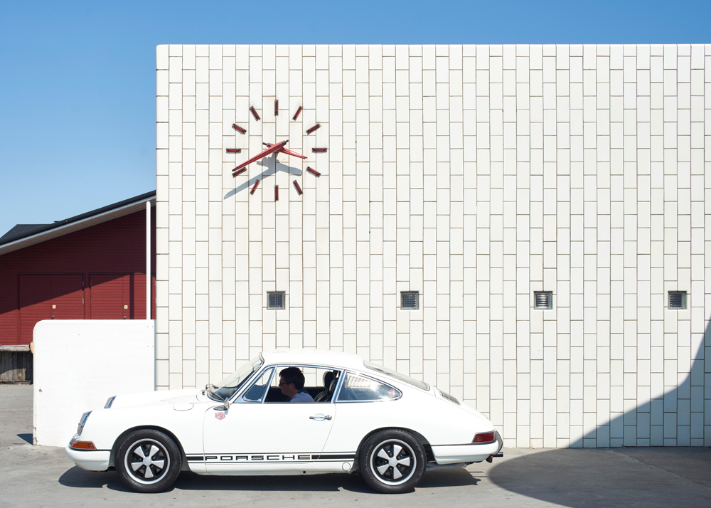 petrol station side wall and white porshe
