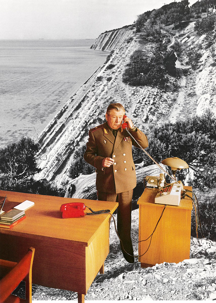 soviet officer answering phones in colour against black white background aerial view