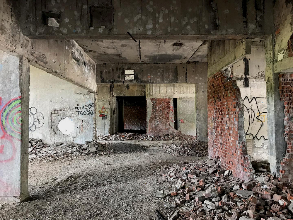 destroyed interior of former hotel 