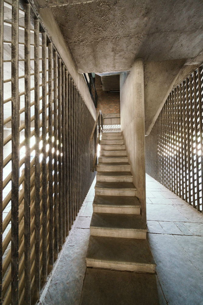 concrete stairs inside corbusier museum Ahmedabad