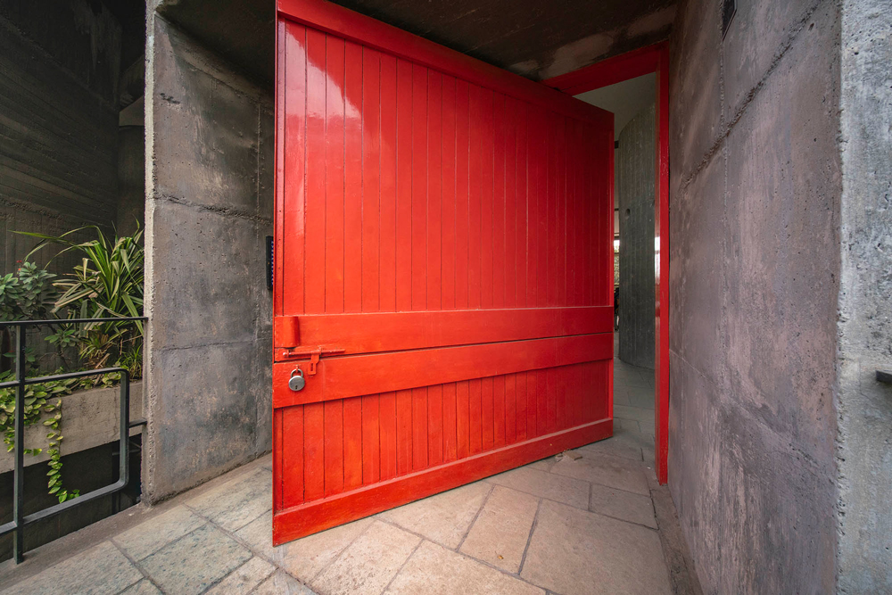 Red door within the Mill Owners Building