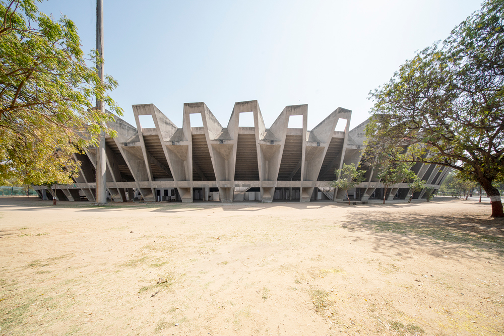 outside the stadium looking towards the concrete brutalist design