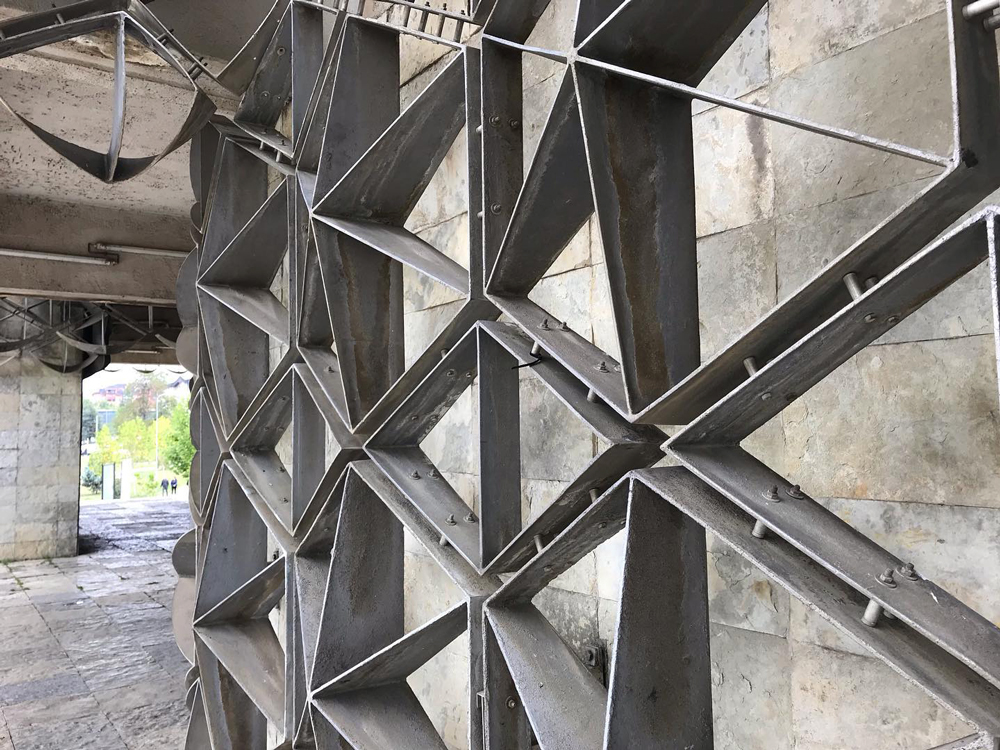detailed cube covered in metal covering facade of national library of kosovo