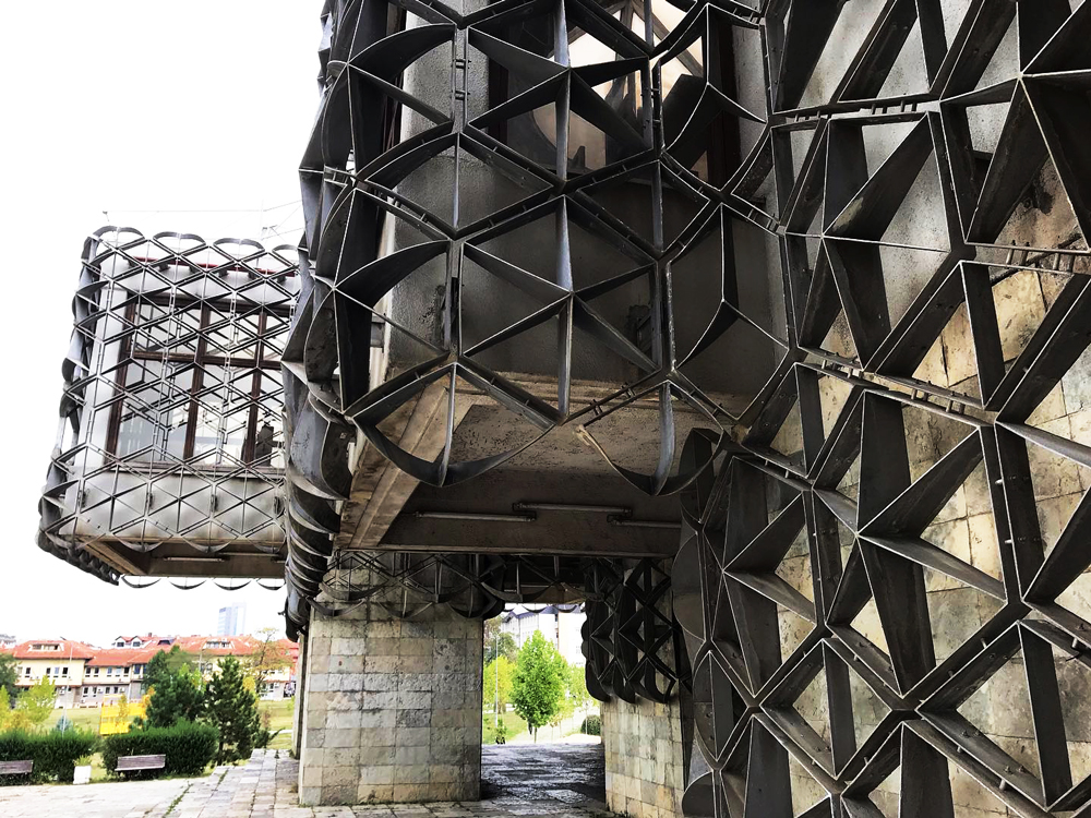 detail from ground level of facade of National Library of Kosovo