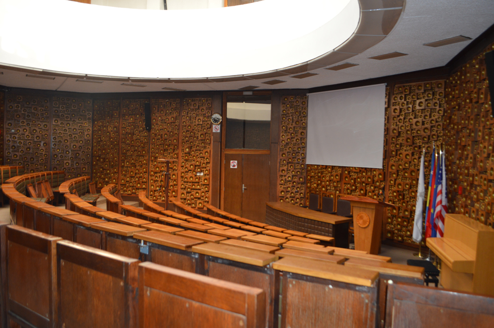 theatre style hall with detailed wooden design 