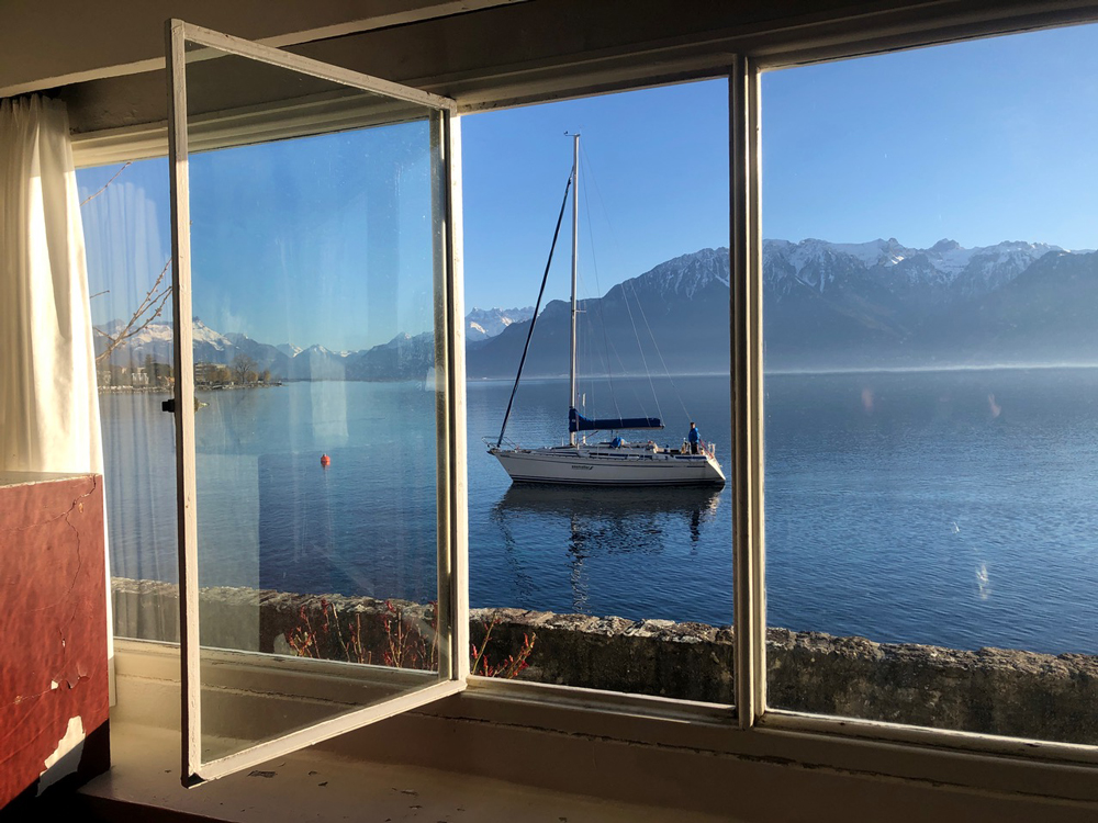 tranquil image out to lake with boat