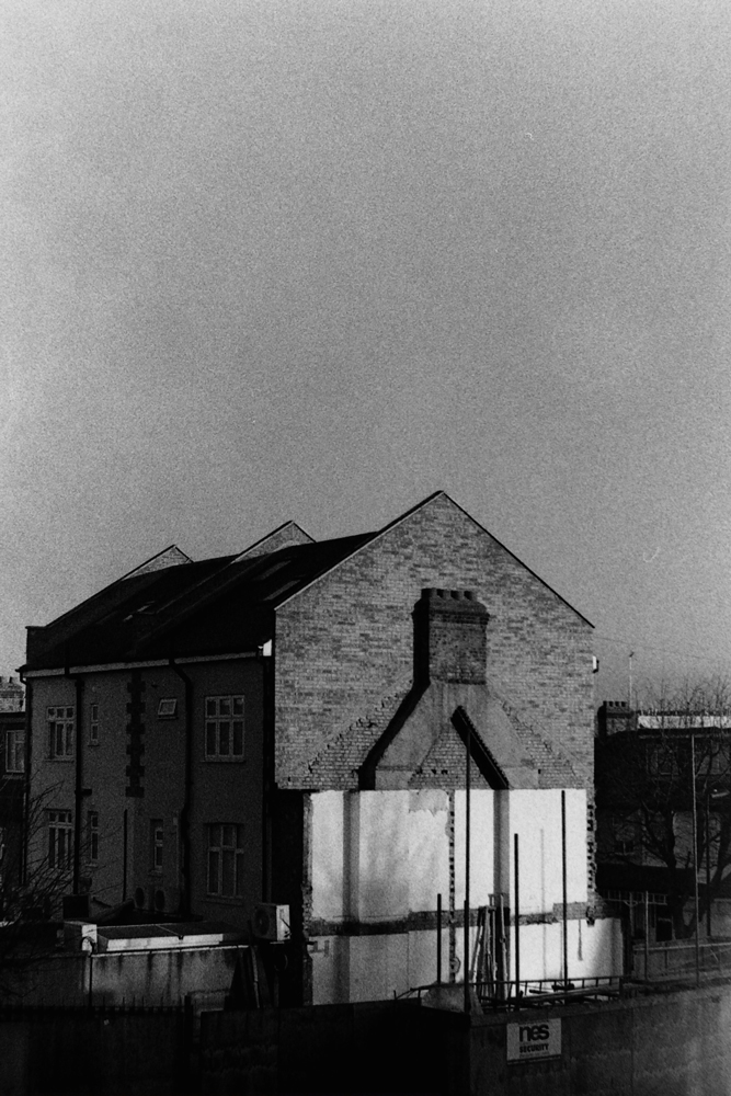 house in london street black and white night shot