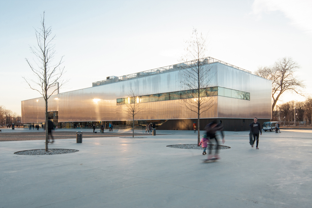 garage museum moscow with skaters from gorky park in the foreground