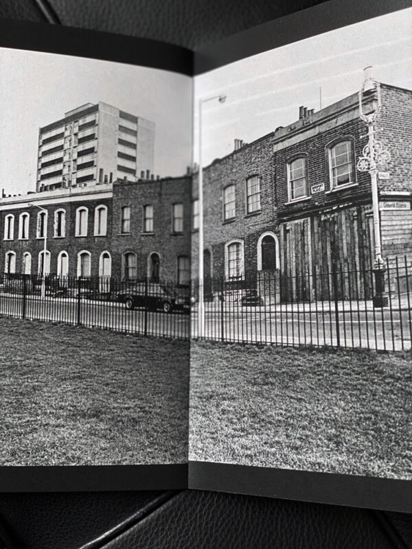 East end square with sparse grass