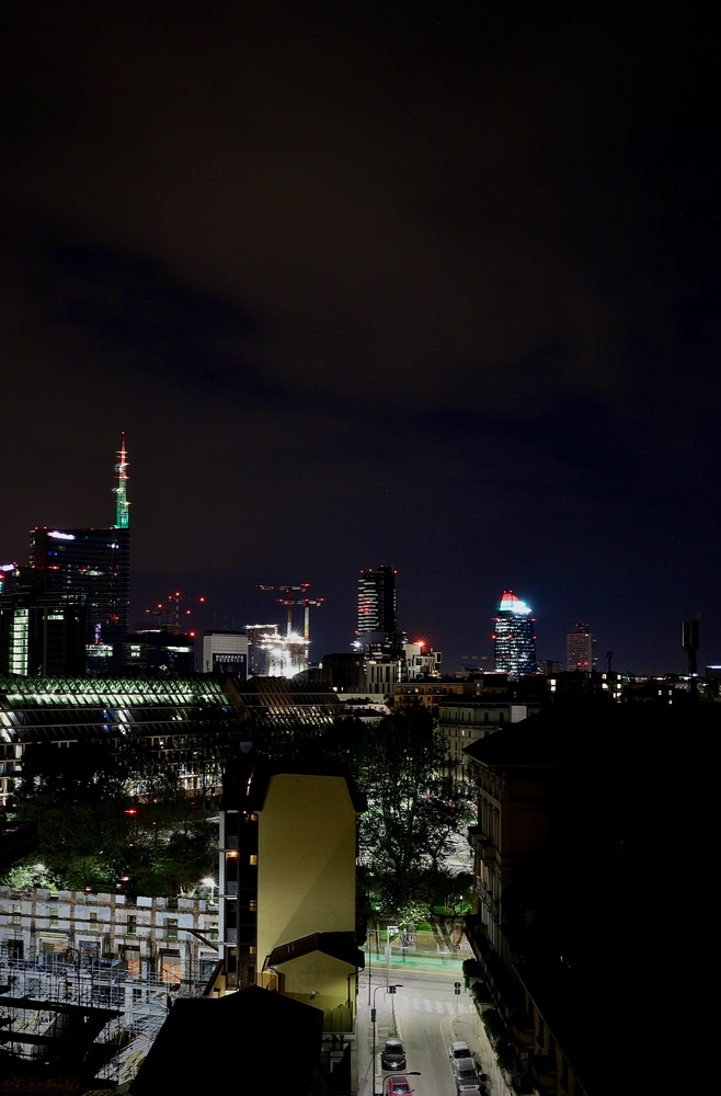 roof tops over Milan by night