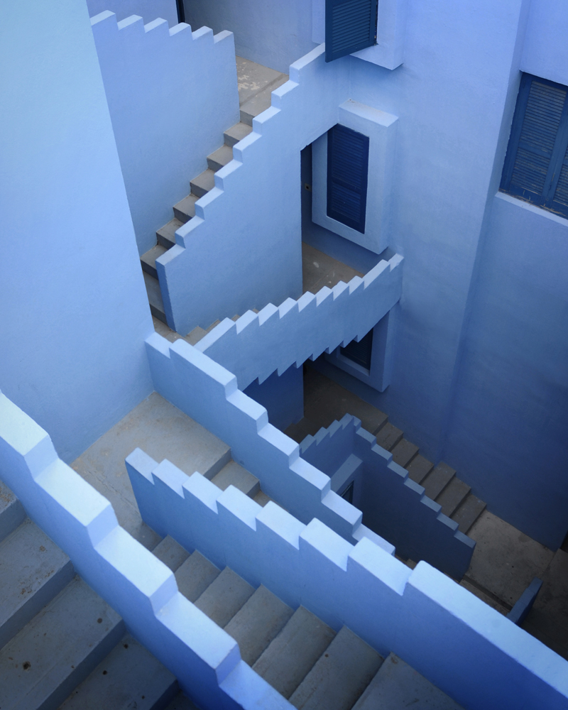 blue building La Muralla Roja