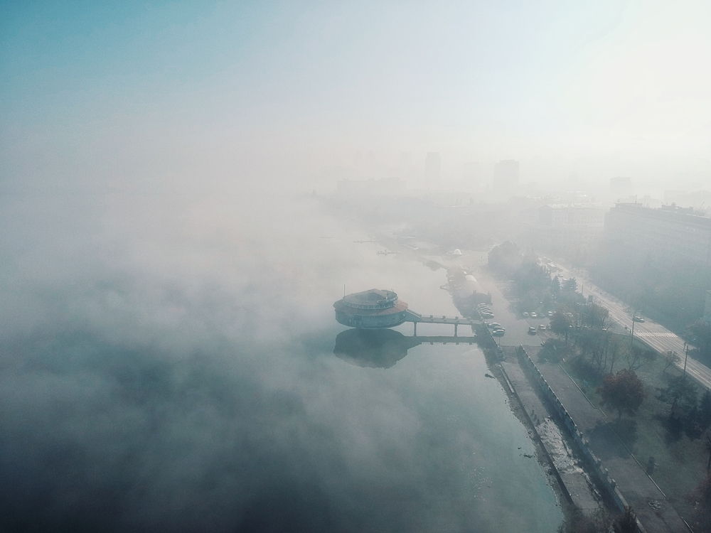 cafe in mist overlooking the river