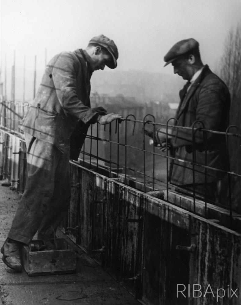 workmen on roof of isoken 