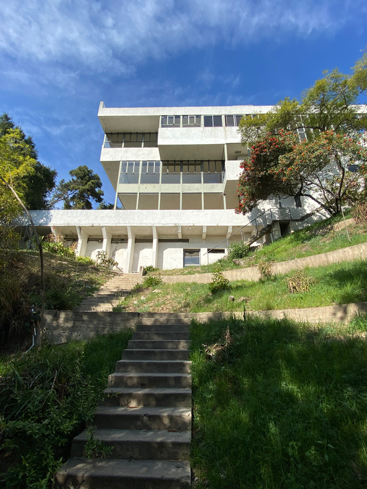 front of house with steps leading down