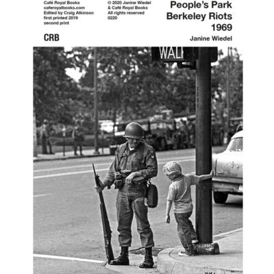 soldier on streets of Berkeley looking at child