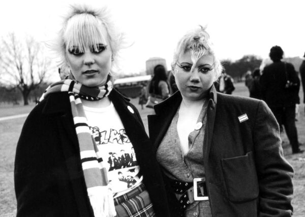 two female punks pose for photographer