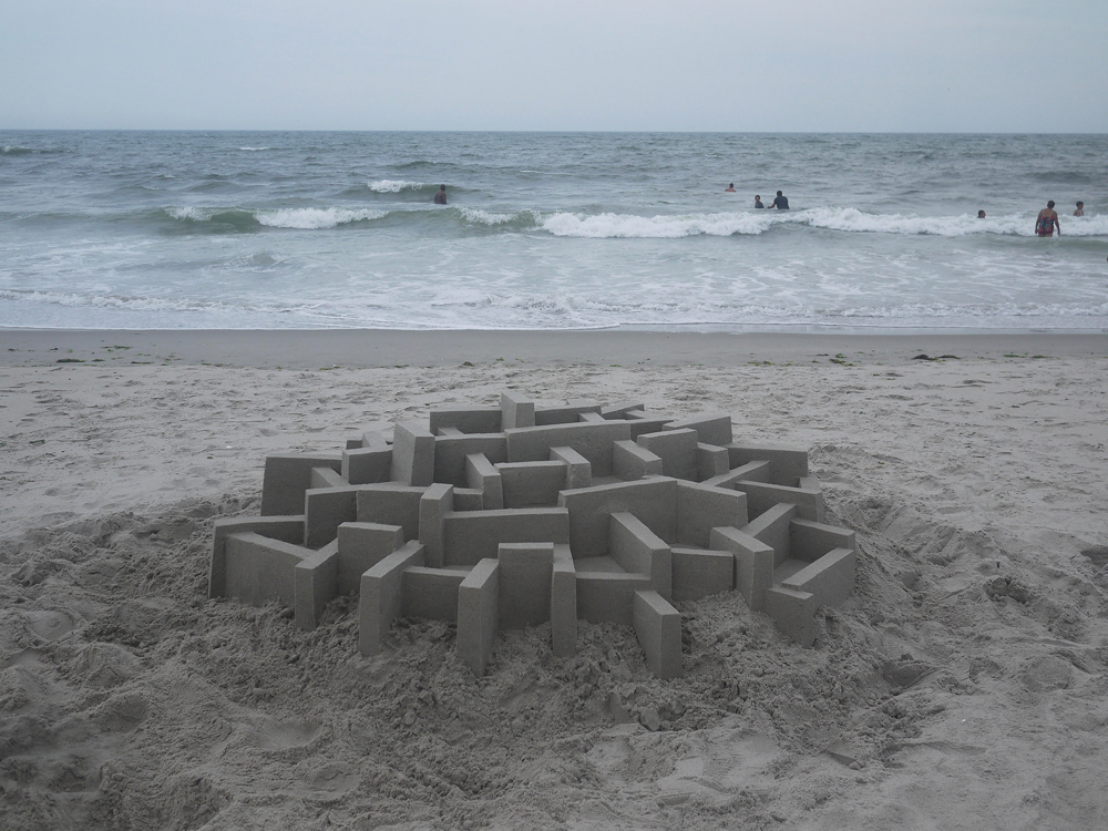 sandcastle before waves crash in Calvin Seibert 