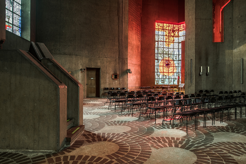 rose window and interior bathed in rose colour