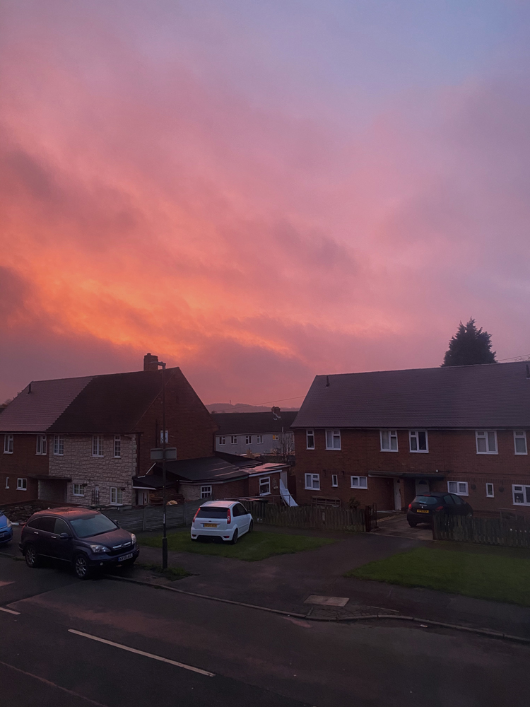 sunset in derbyshire with a pink sky